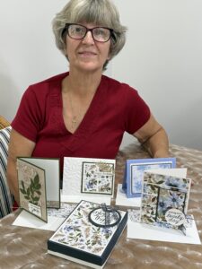 A set of four handmade cards and a gift box project made during a cardmaking class. Perfect for gift giving.